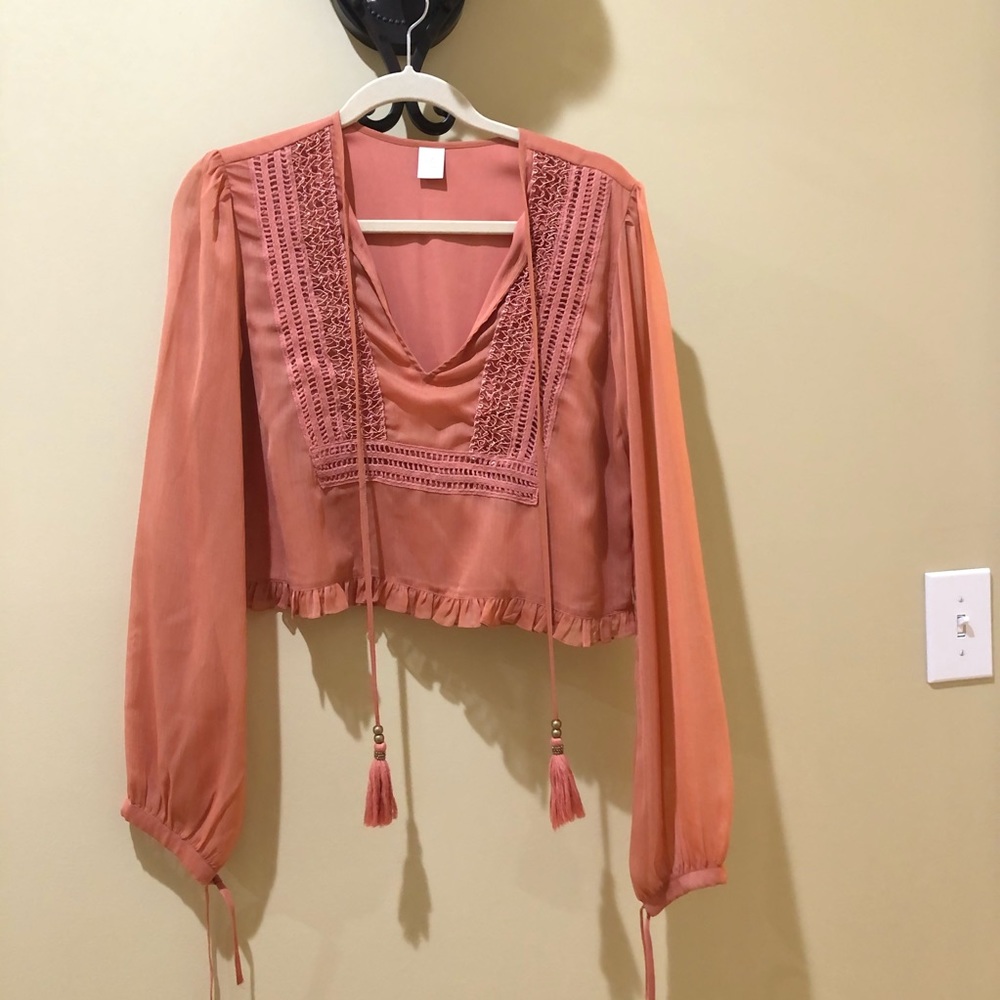Fall balloon sleeve top with tassels